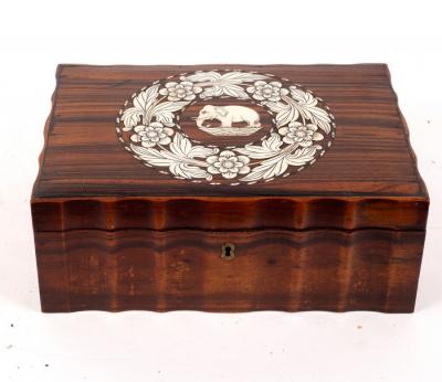 Appraisal: An Anglo Indian calamander work box the cover inlaid an