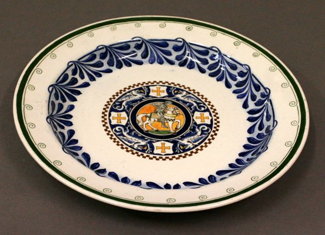 Appraisal: A Royal Doulton plate decorated with a central roundel depicting