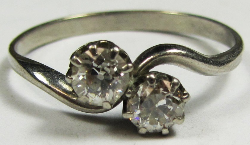 Appraisal: A diamond set two stone ring claw set with cushion