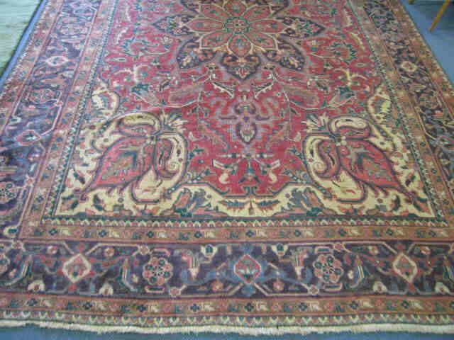 Appraisal: Heriz Persian Handmade Room Size Rug large floral central medallion