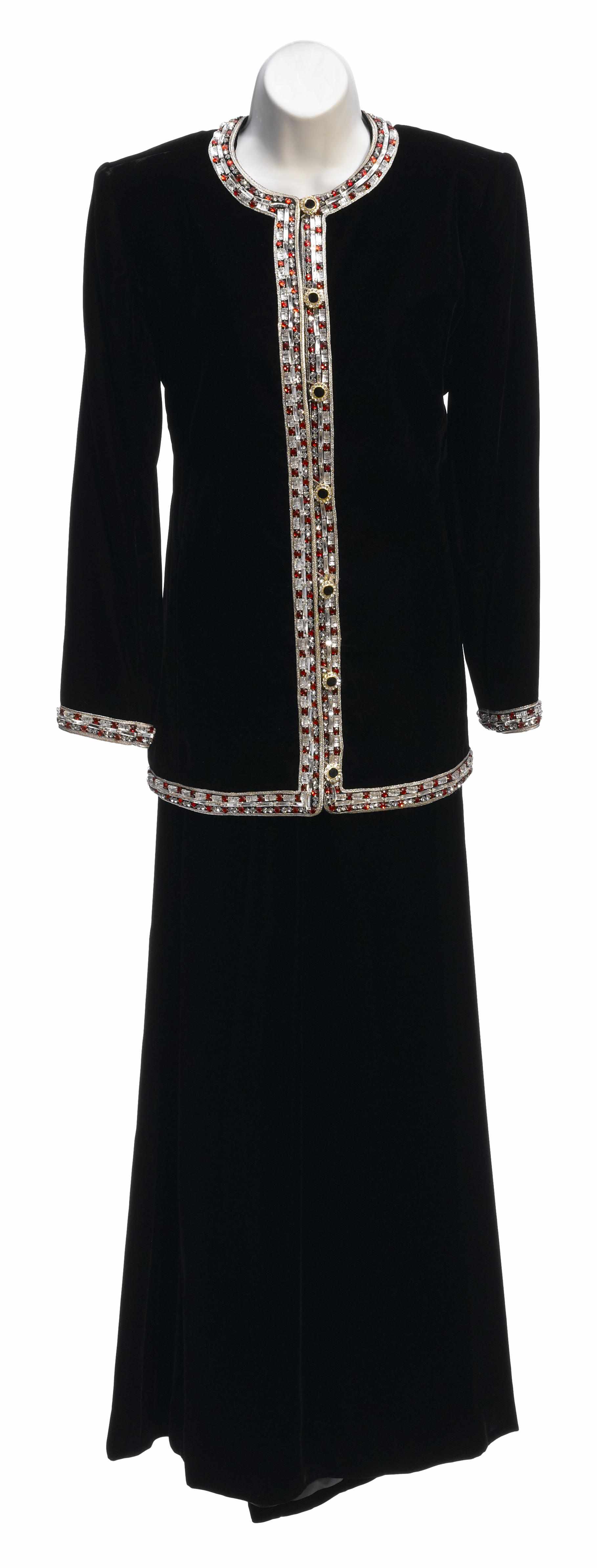 Appraisal: An Yves St Laurent long black velvet and rhinestone trimmed