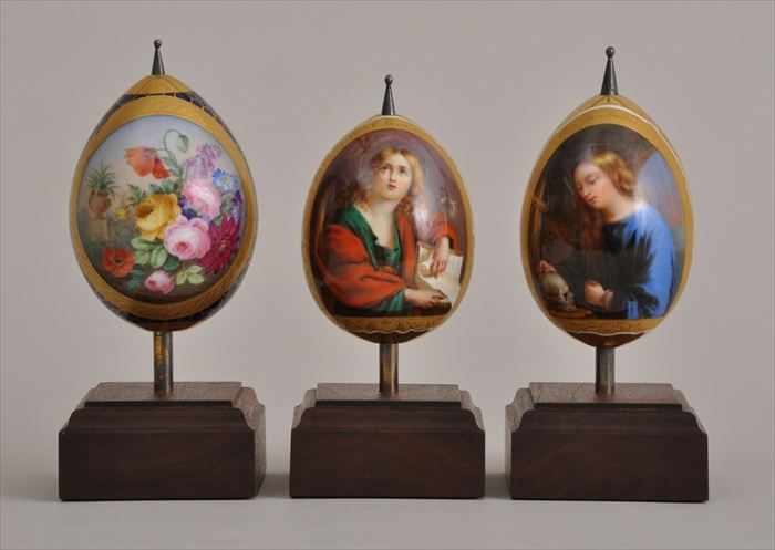 Appraisal: THREE RUSSIAN PORCELAIN EGG-FORM BELL PULLS Two painted with heads