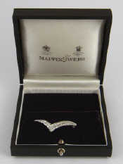 Appraisal: An carat white gold diamond brooch by Mappin Webb approx