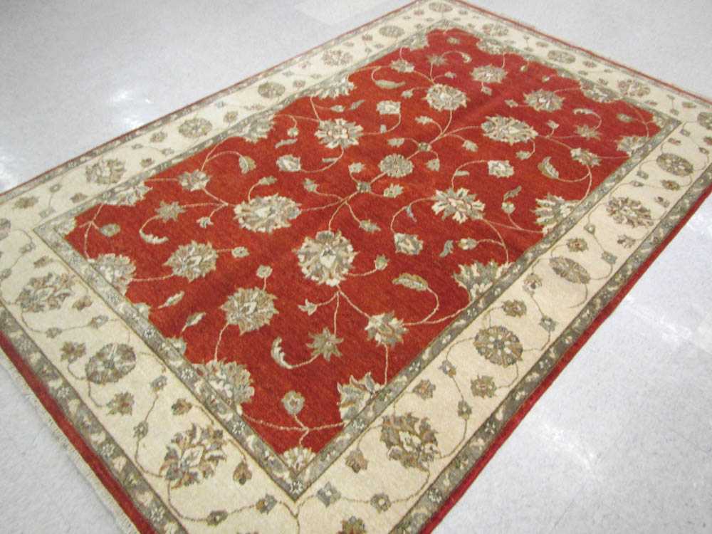 Appraisal: HAND KNOTTED ORIENTAL CARPET Indo-Persian Isfahan floral design on red