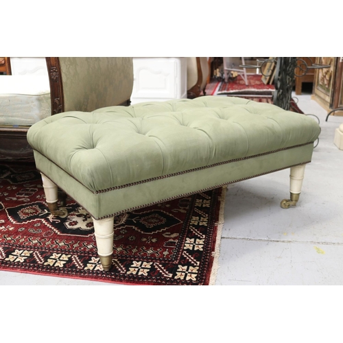 Appraisal: Large size ottoman with green deep button upholstery standing on