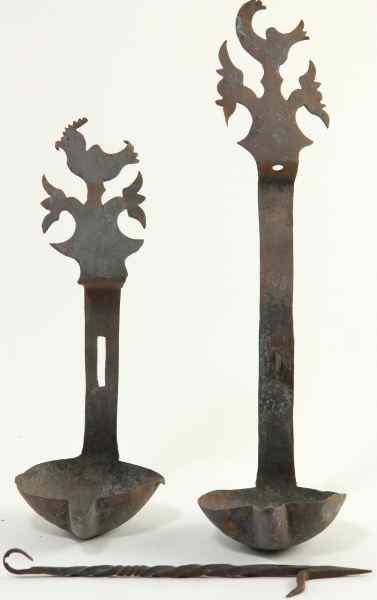 Appraisal: Two Spanish Betty Lampspossibly th century wrought iron lamps with