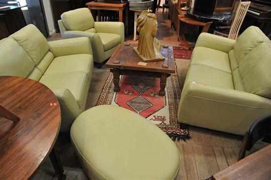 Appraisal: A GREEN LEATHER SUITE OF THREE SEATER TWO SEATER AND