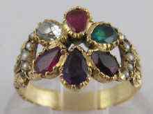 Appraisal: A high carat gold ''REGARD'' ring set with ruby emerald