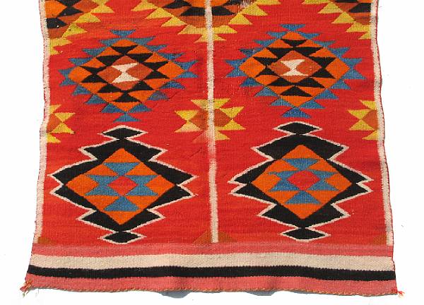 Appraisal: A Navajo transitional period rug size approximately ft in x