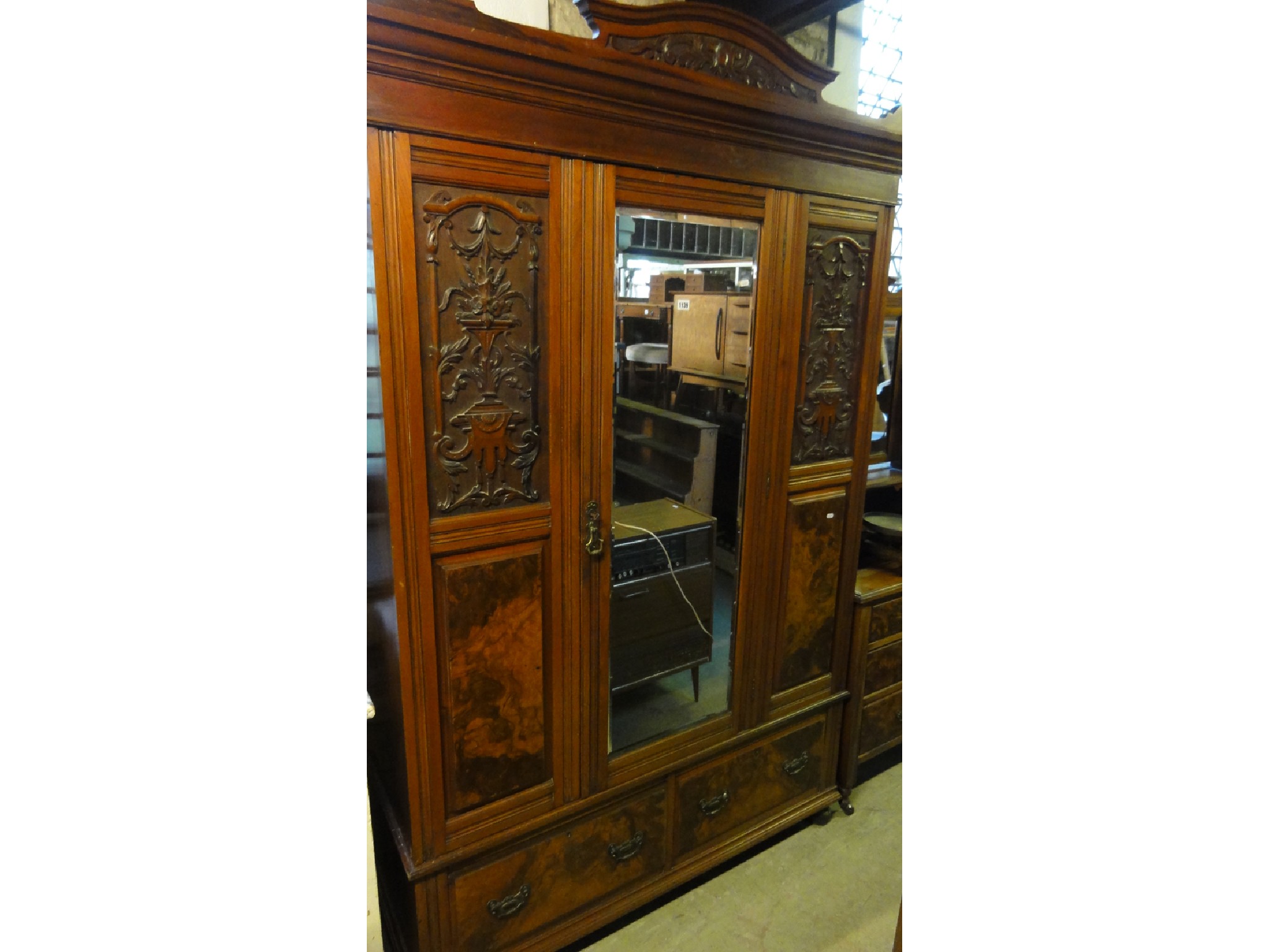 Appraisal: A late Victorian walnut three piece bedroom suite with decorative