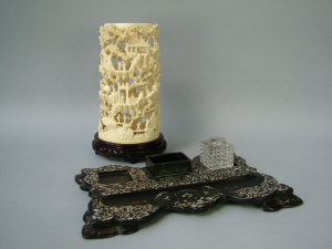 Appraisal: A Chinese ivory tusk section profusely carved with traditional figures