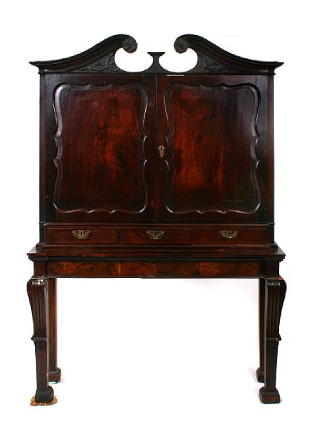 Appraisal: A Renaissance style mahogany cabinet on stand restorations repairs height