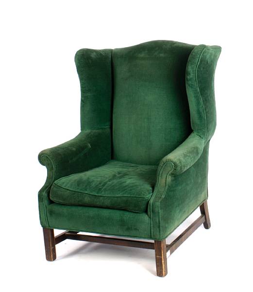 Appraisal: A pair of George III style upholstered wing back chairs