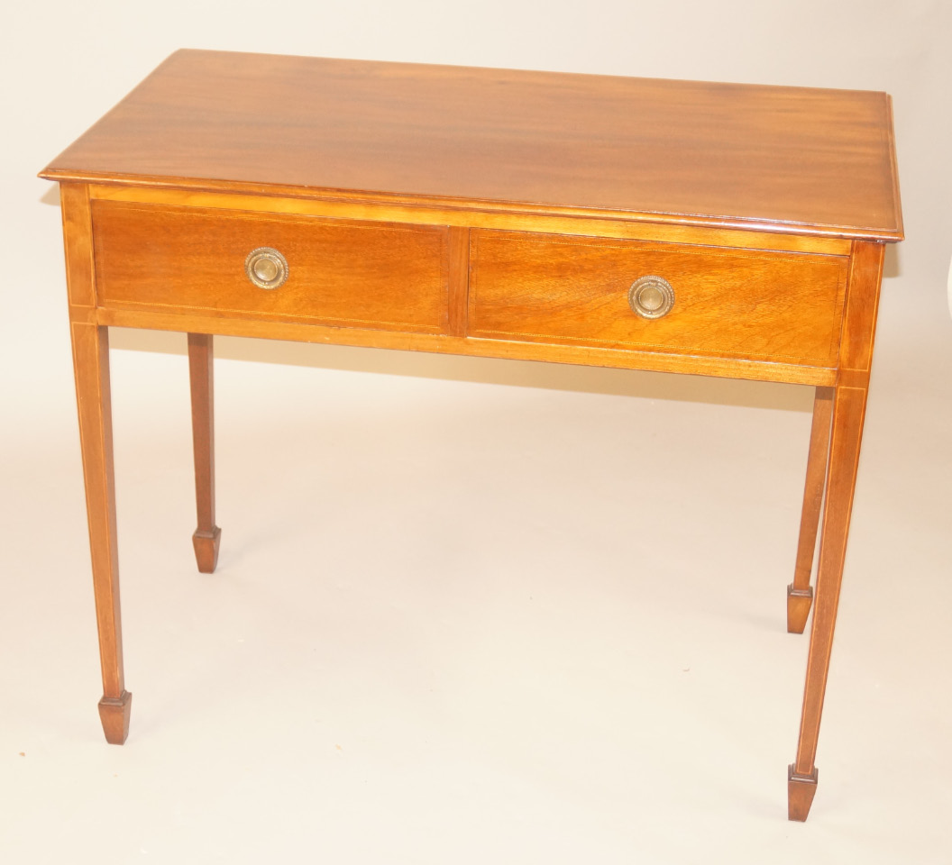 Appraisal: An Edwardian mahogany and chequer banded side table two frieze