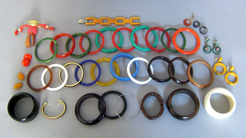 Appraisal: Bakelite plastic and wood jewelry to include bangles earrings etc