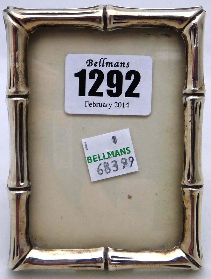 Appraisal: A Tiffany Co Sterling mounted rectangular photograph frame the border