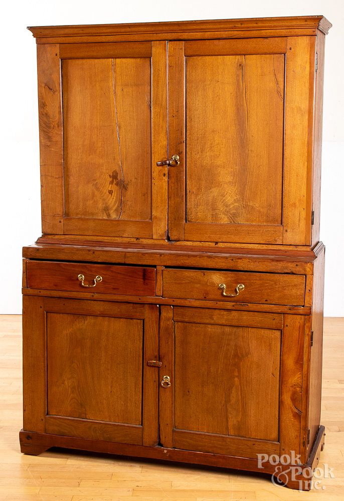 Appraisal: Walnut two-part stepback cupboard early th c Walnut two-part stepback