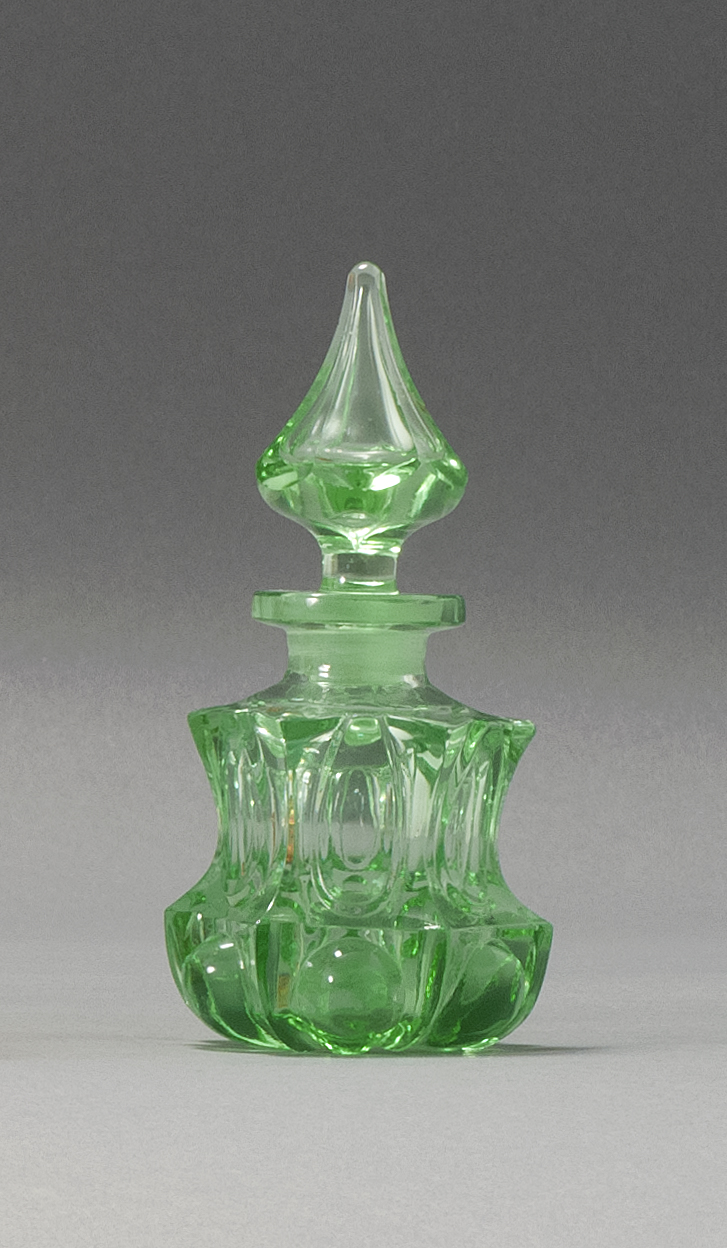 Appraisal: SANDWICH GLASS COMPANY BLOWN-MOLDED COLOGNE BOTTLE Mid- th CenturyIn a