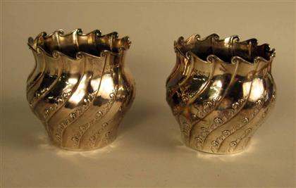 Appraisal: Pair of Victorian sterling silver vases rupert favell london Each