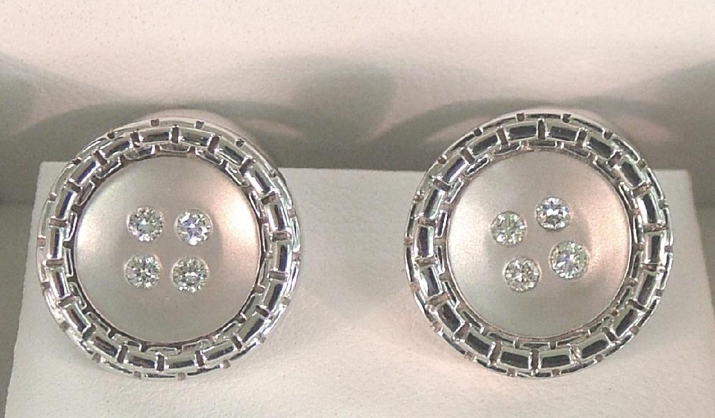 Appraisal: Pair of modern k white gold circular gentleman's cufflinks each