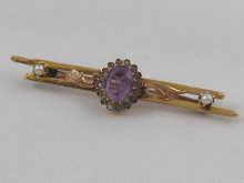 Appraisal: A yellow metal tests carat gold amethyst and pearl bar