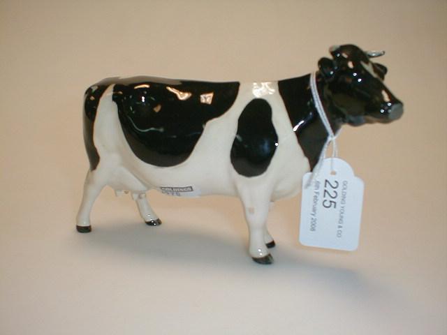 Appraisal: A Beswick Fresian cow ch Claybury Legwater designed by Arthur