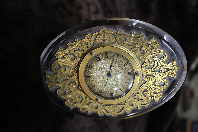 Appraisal: A VICTORIAN OVAL GLASS CASED EASEL TYPE DESK TIMEPIECE with