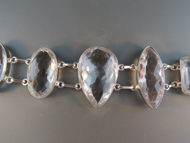 Appraisal: Sterling Silver Quartz Bracelet vivid gems mixed shapes totaling over