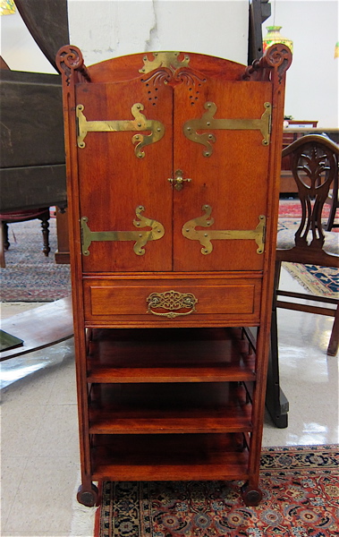 Appraisal: LATE VICTORIAN MAHOGANY FINISH MUSIC CABINET American c featuring a