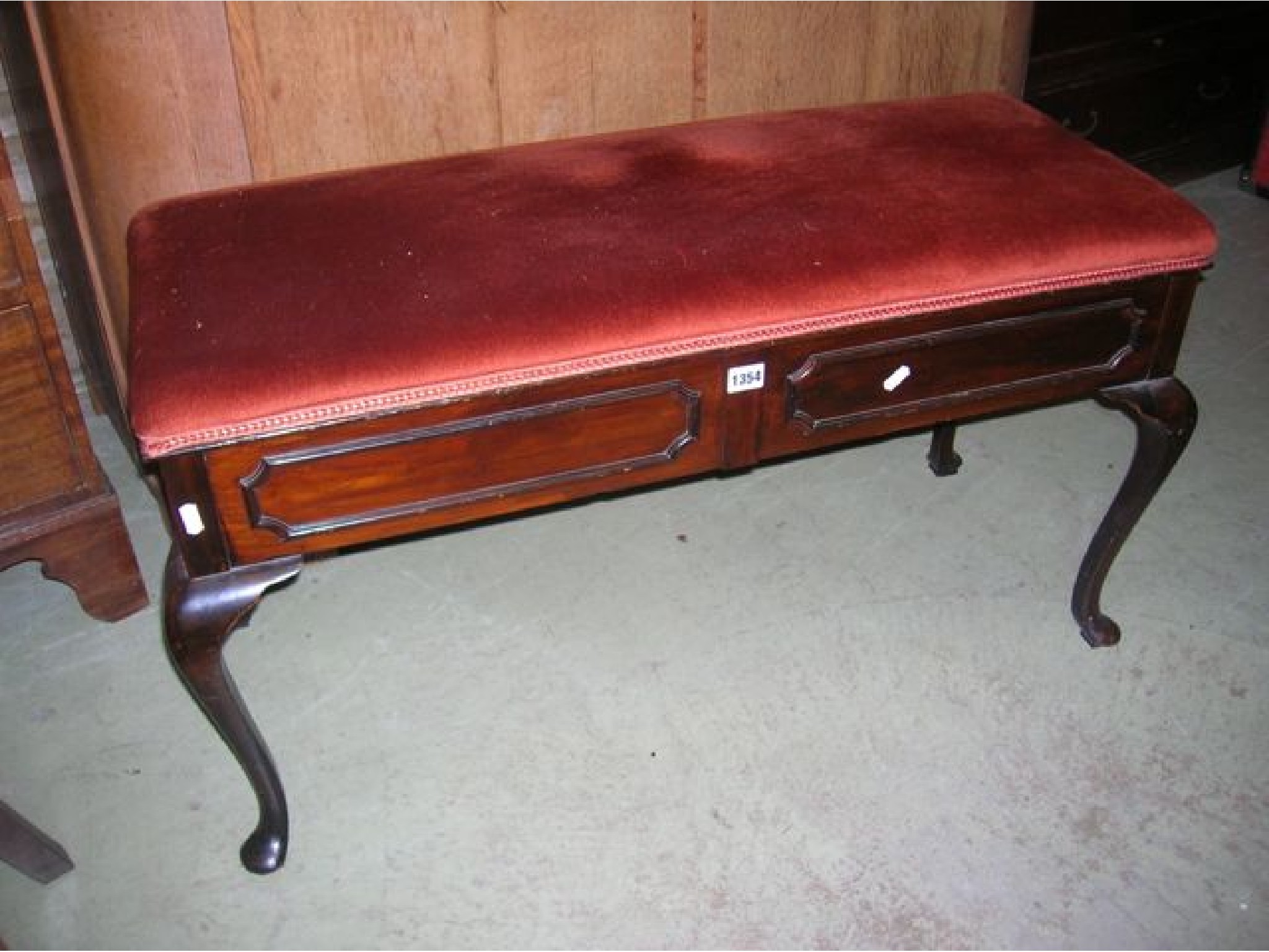 Appraisal: An Edwardian duet piano stool with shallow upholstered hinged box