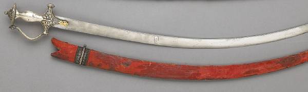 Appraisal: An Indian tulwar th century Curved inch blade showing traces