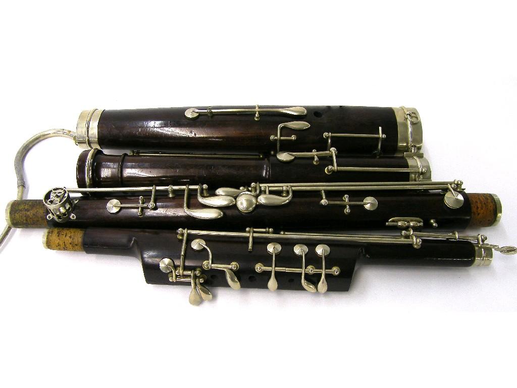 Appraisal: Rosewood and nickel mounted bassoon by and stamped Buffet Crampon