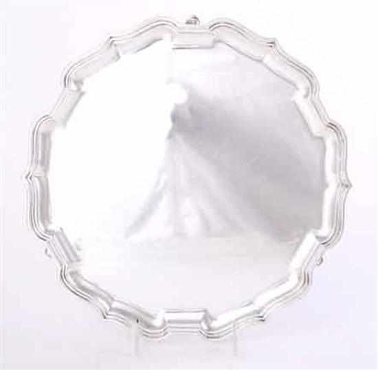 Appraisal: English sterling footed salver Mappin Webb Sheffield dated double-banded shaped