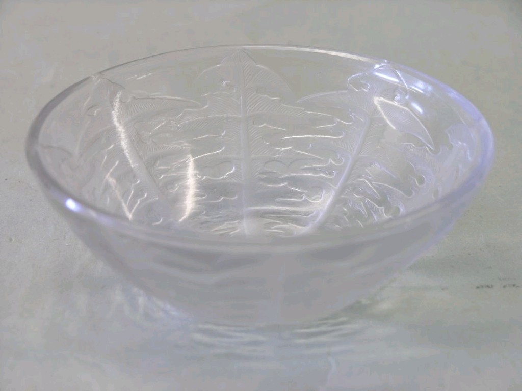 Appraisal: A Lalique finger bowl pre-war holly leaf pattern moulded mark