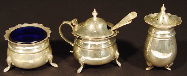 Appraisal: Silver three piece cruet comprised a mustard with blue glass