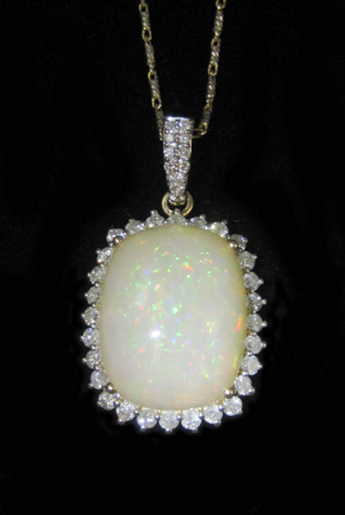 Appraisal: OPAL AND DIAMOND PENDANT NECKLACE IN FOURTEEN KARAT GOLD having