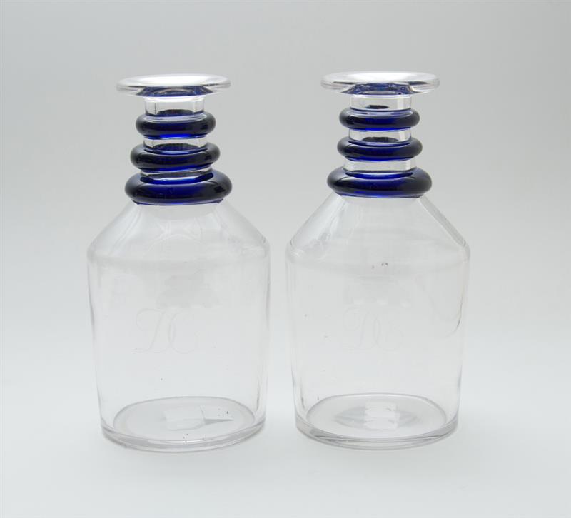 Appraisal: PAIR OF ENGLISH BLUE-RING NECKED GLASS DECANTERS Lacking stoppers in