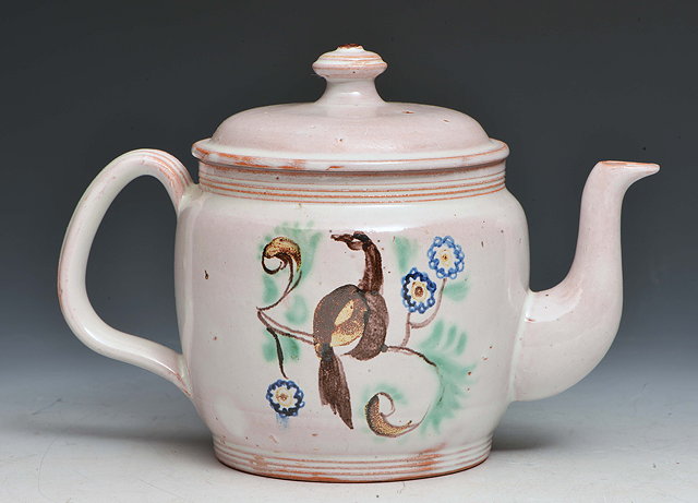 Appraisal: Rosemary Wren British - Teapot and cover painted with birds