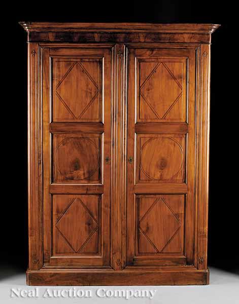 Appraisal: A Louis Philippe Carved Walnut Armoire th c molded cornice