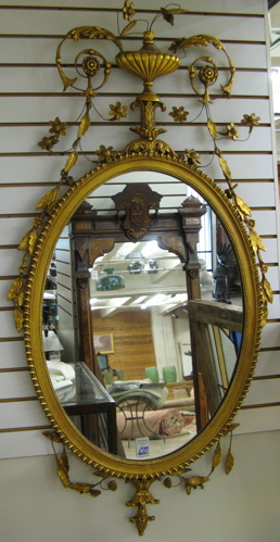 Appraisal: AN AMERICAN ADAM STYLE WALL MIRROR The gilt wood frame