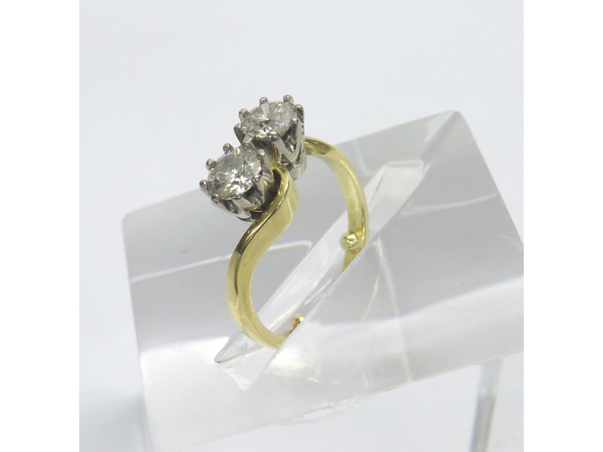 Appraisal: ct yellow gold two stone diamond ring in a swirl