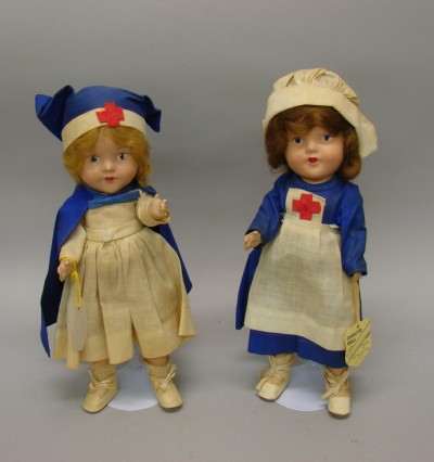 Appraisal: Pair of all original composition Silk Novelty Corp nurse dolls