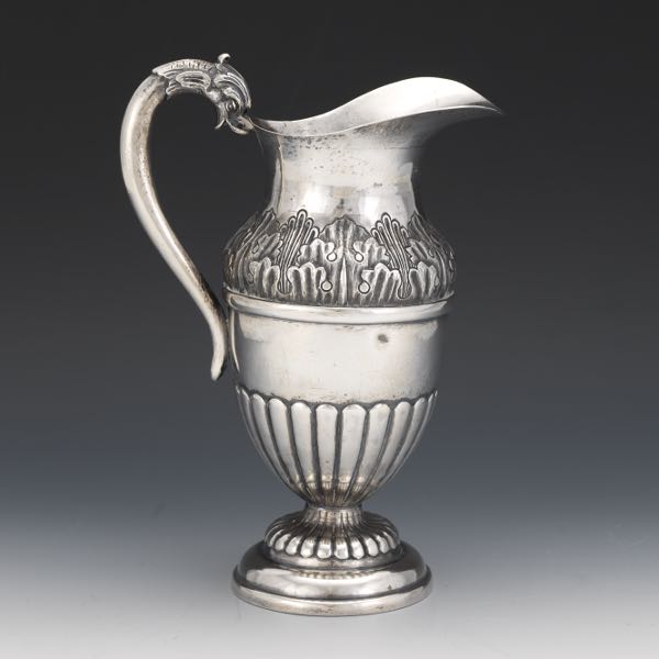 Appraisal: SANBORNS SILVER EWER - Silver ewer with relief designs throughout