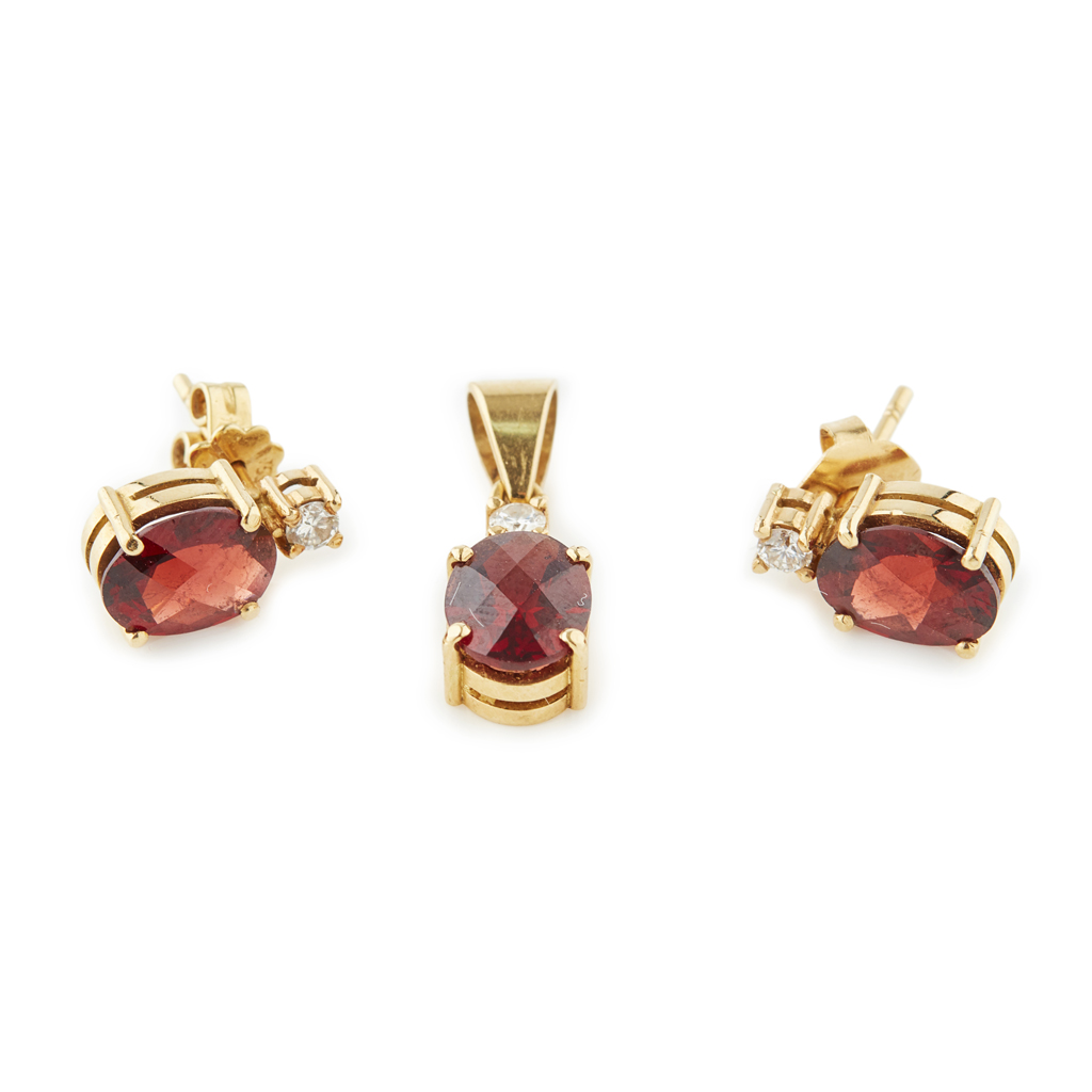 Appraisal: A garnet and diamond set pendant and matching earrings the