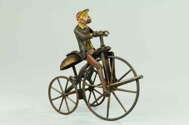 Appraisal: MONKEY ON TRICYCLE BELL TOY J E Stevens painted cast