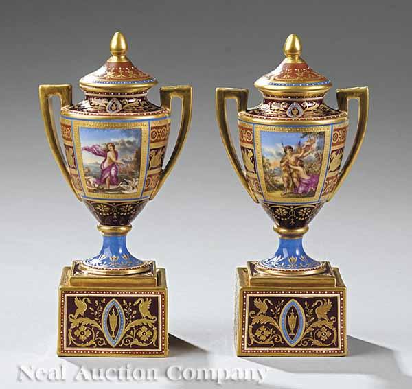 Appraisal: A Pair of Vienna Porcelain Polychrome and Gilt-Decorated Lidded Urns