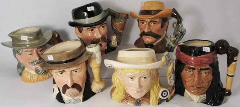 Appraisal: Royal Doulton Character Jugs Wild West Collection Comprising Annie Oakley