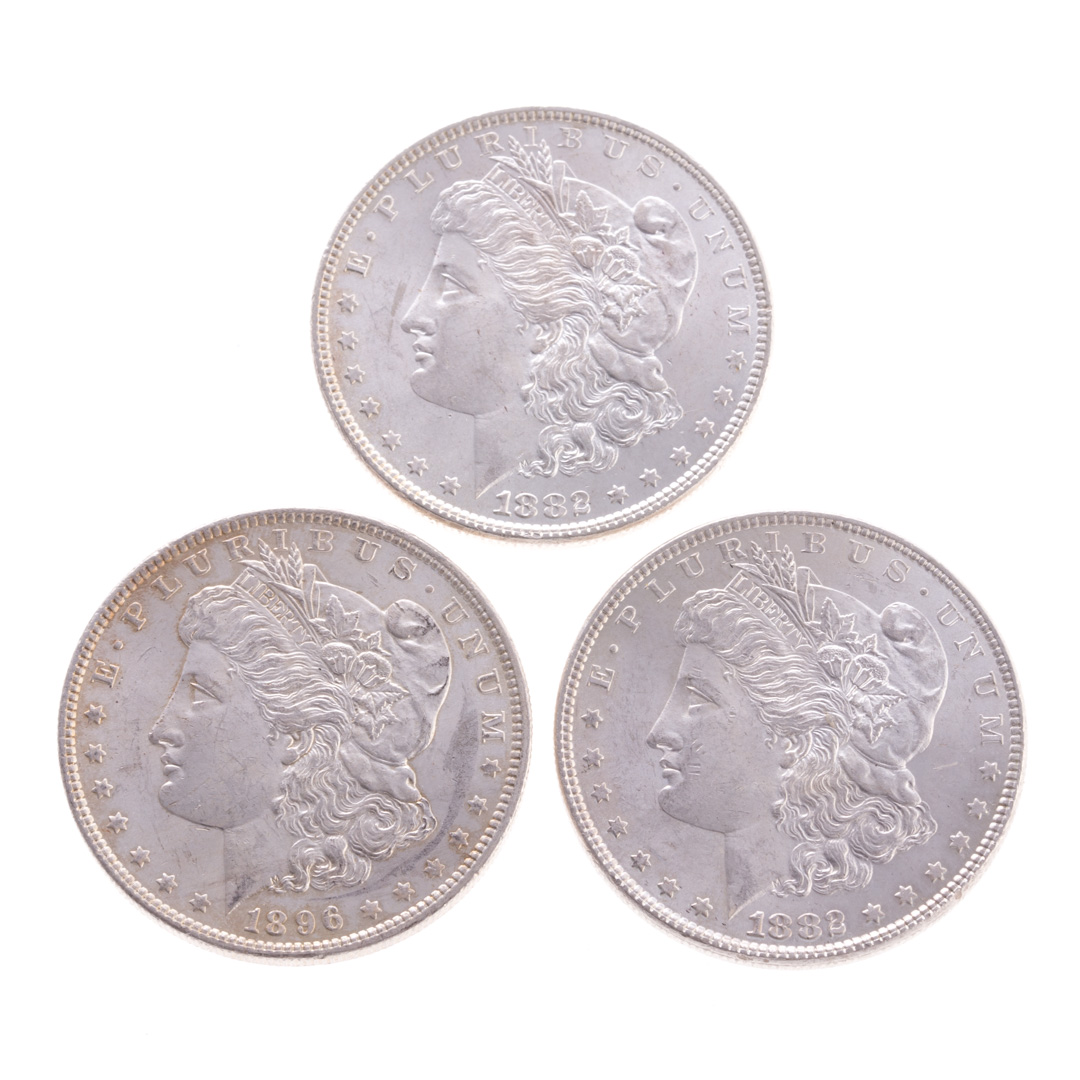 Appraisal: US Better-Grade Morgan Dollars Three better-grade US Morgan Silver Dollars