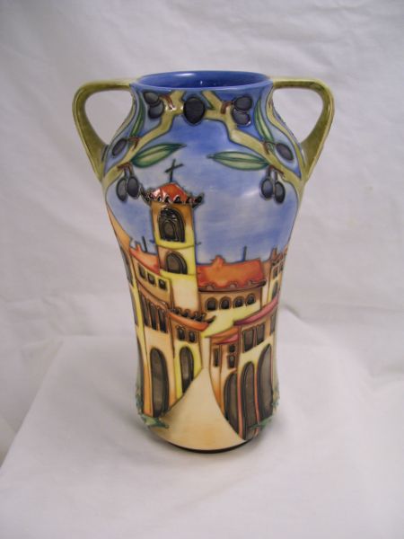 Appraisal: Moorcroft Pottery Vase Village scene Some crazing Signed by artist