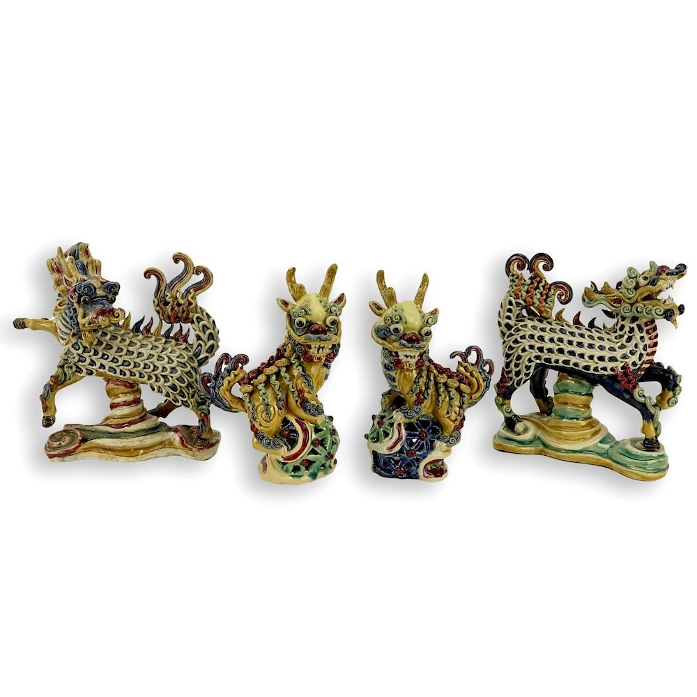 Appraisal: Four Chinese Glazed Pottery Foo Dogs Figures Four Chinese Glazed